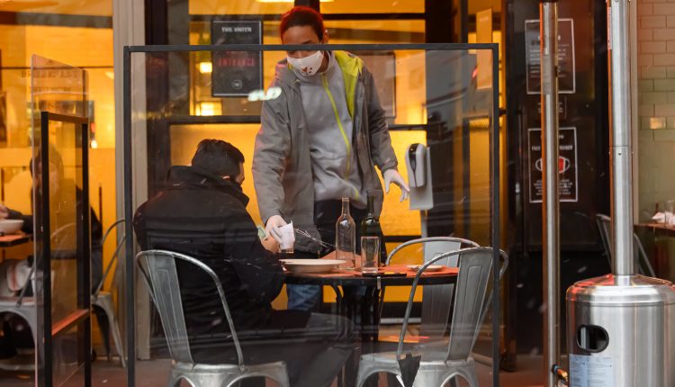 Black restaurant workers tipped less than others during the pandemic

