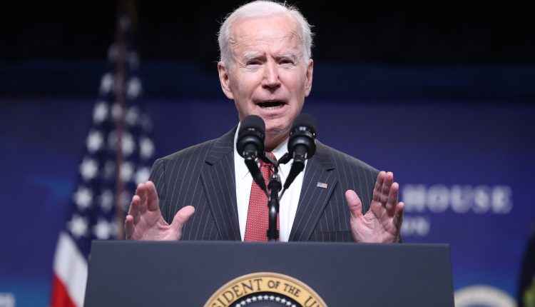 Biden speaks at the Pfizer vaccine manufacturing site as the storm delays deliveries

