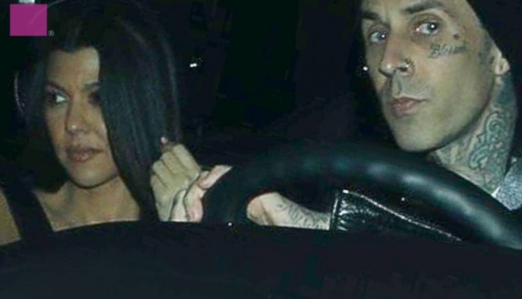 Kourtney Kardashian and Travis Barker have a playful thumb war

