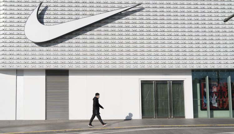 Nike shares tumble after mixed earnings reports, layoff news

