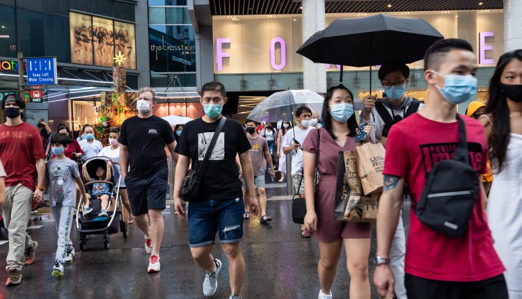 Singapore's foreign minister says Covid won't go away entirely

