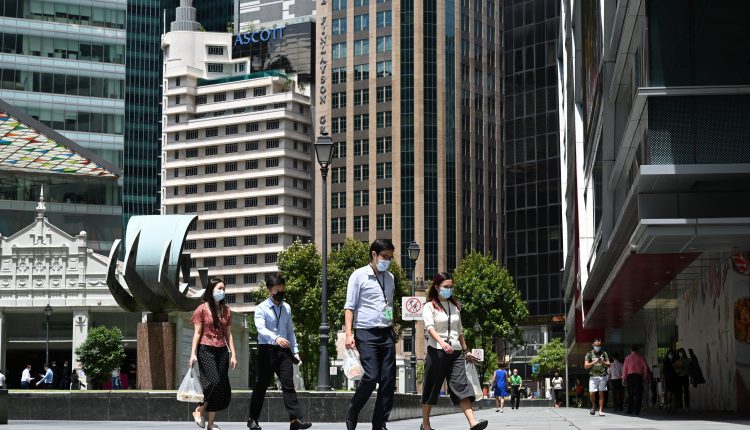 Singapore closes schools as coronavirus cases rise

