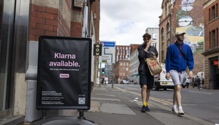 Shoppers deal with holiday debt