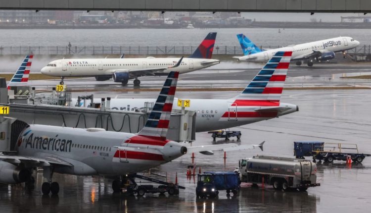 Airline stocks tumble after Delta trims profit forecast