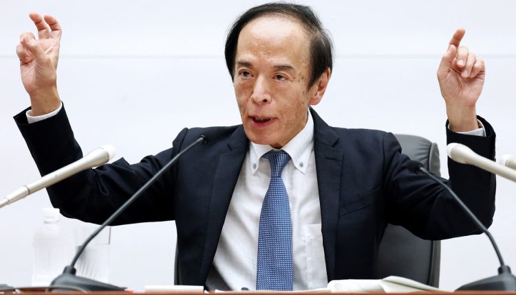 Bank of Japan retains its ultra-loose policy, trims core inflation forecast