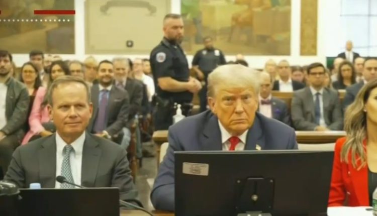 Trump sitting at the defense table during his New York fraud trial.