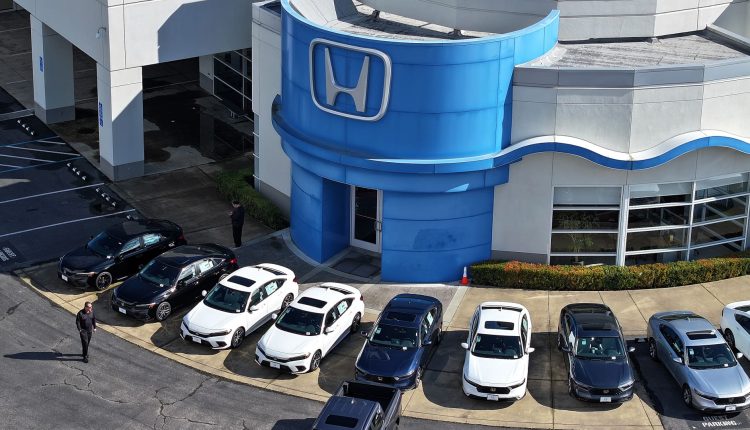 Honda-Nissan merger talks, Nikkei reports

